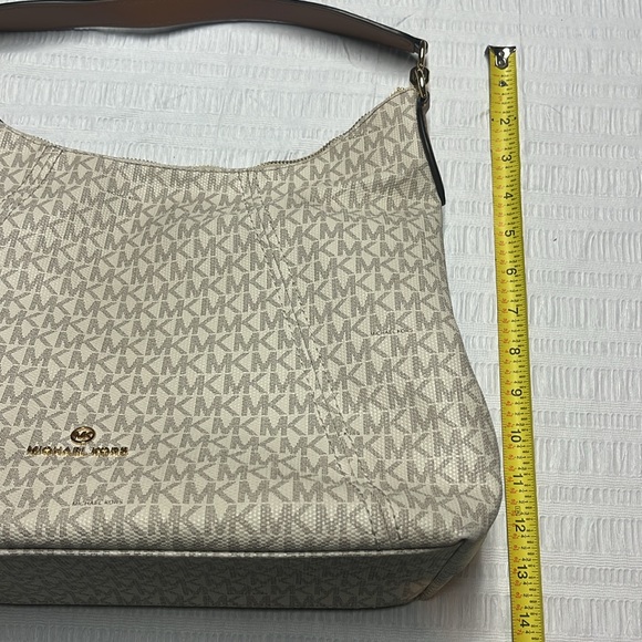 Michaell Kors signature shoulder bag- cream background with gray-ish MK’s. - Picture 12 of 16